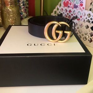 Dark brown and gold Gucci belt